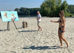 artist painting on canvas angel on island Koh Chang Sremski Karlovci